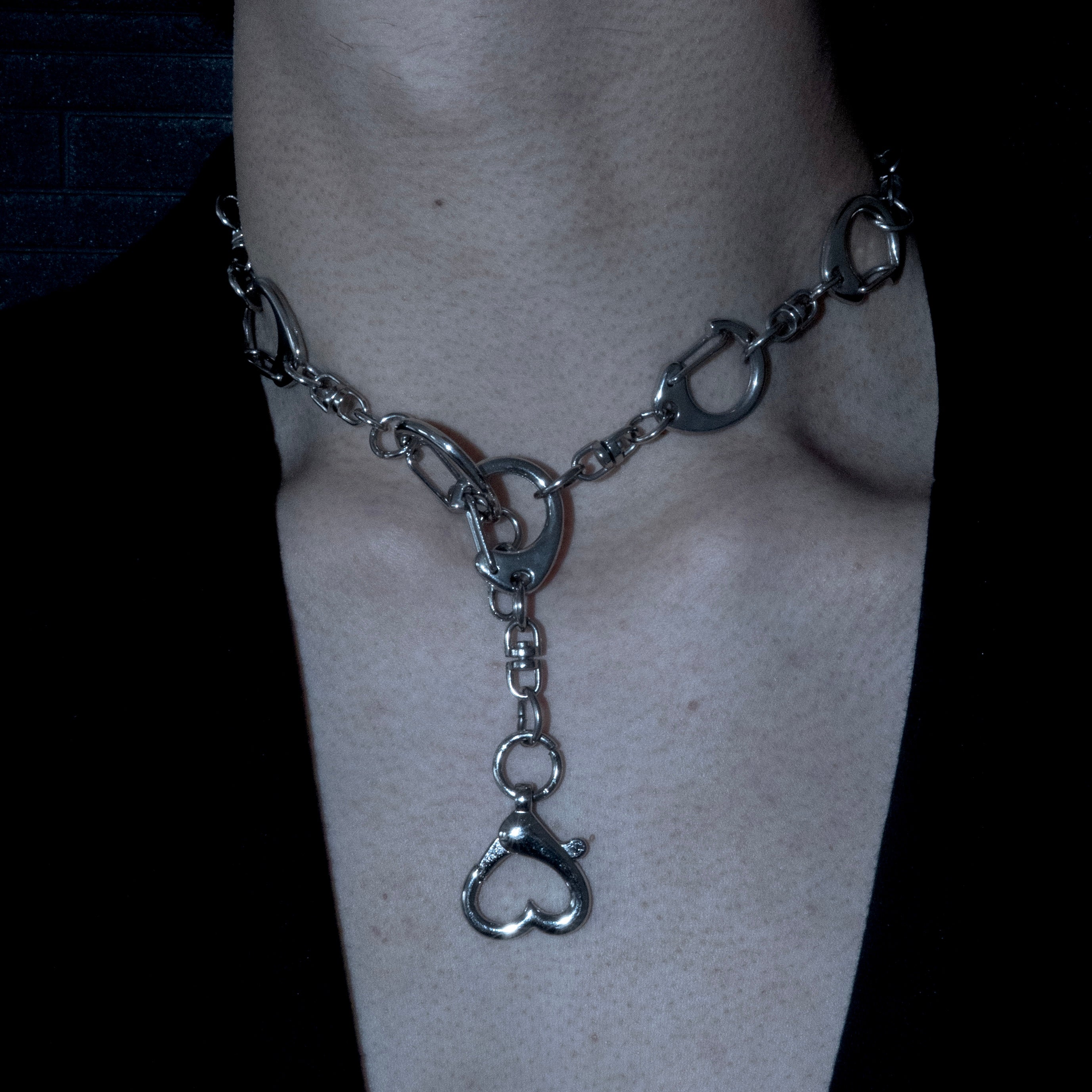 Hand cuffs necklace